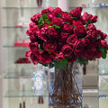 Red English Roses in 16″ Glass Rota Vase